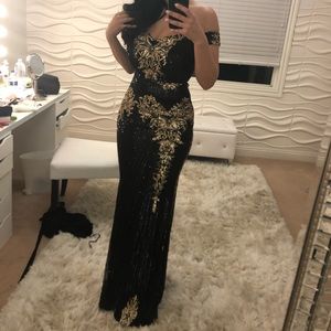 Black and gold sparkly dress